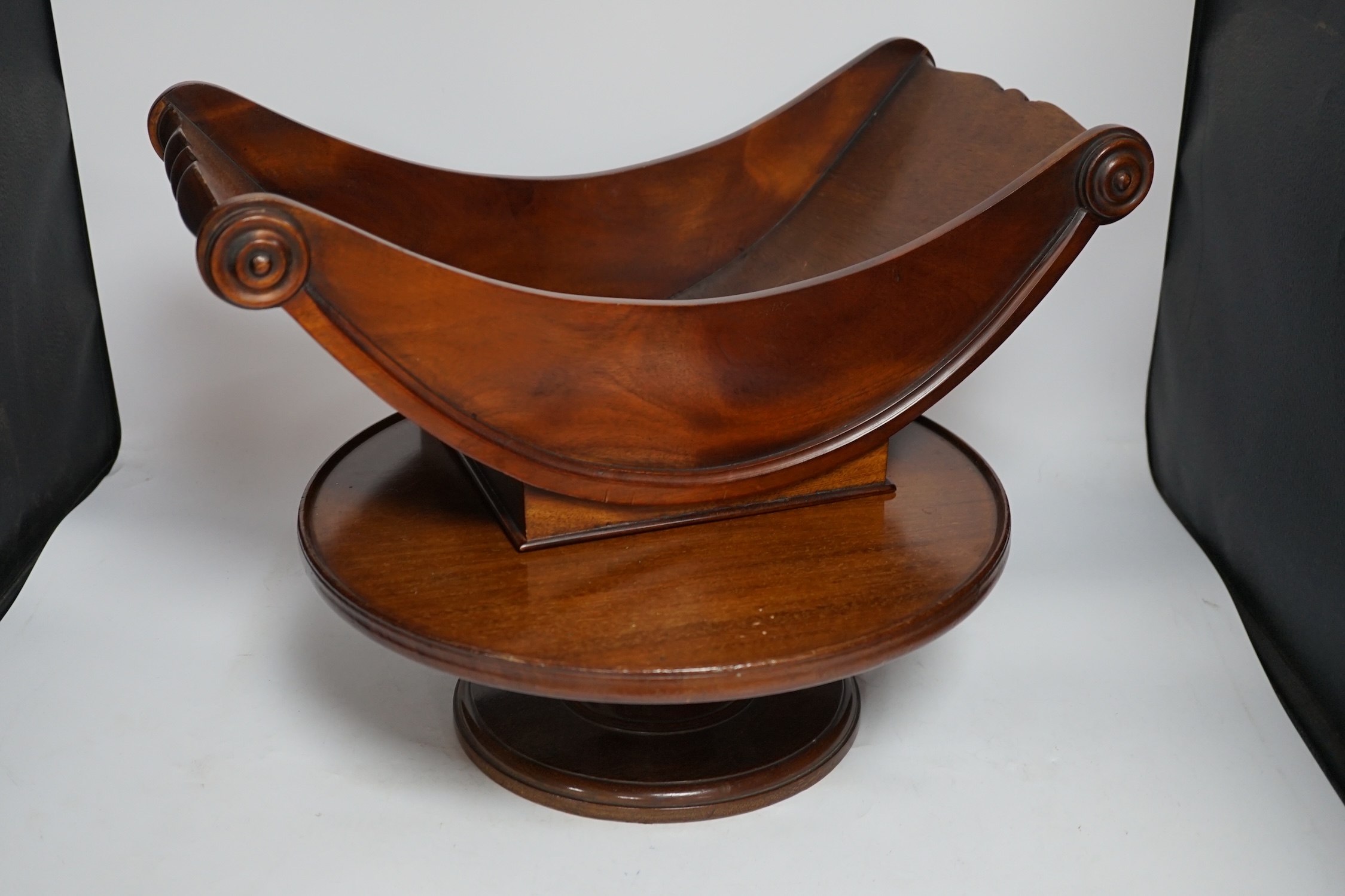 A large reproduction mahogany cheese coaster and a Lazy Susan, largest 50cm wide